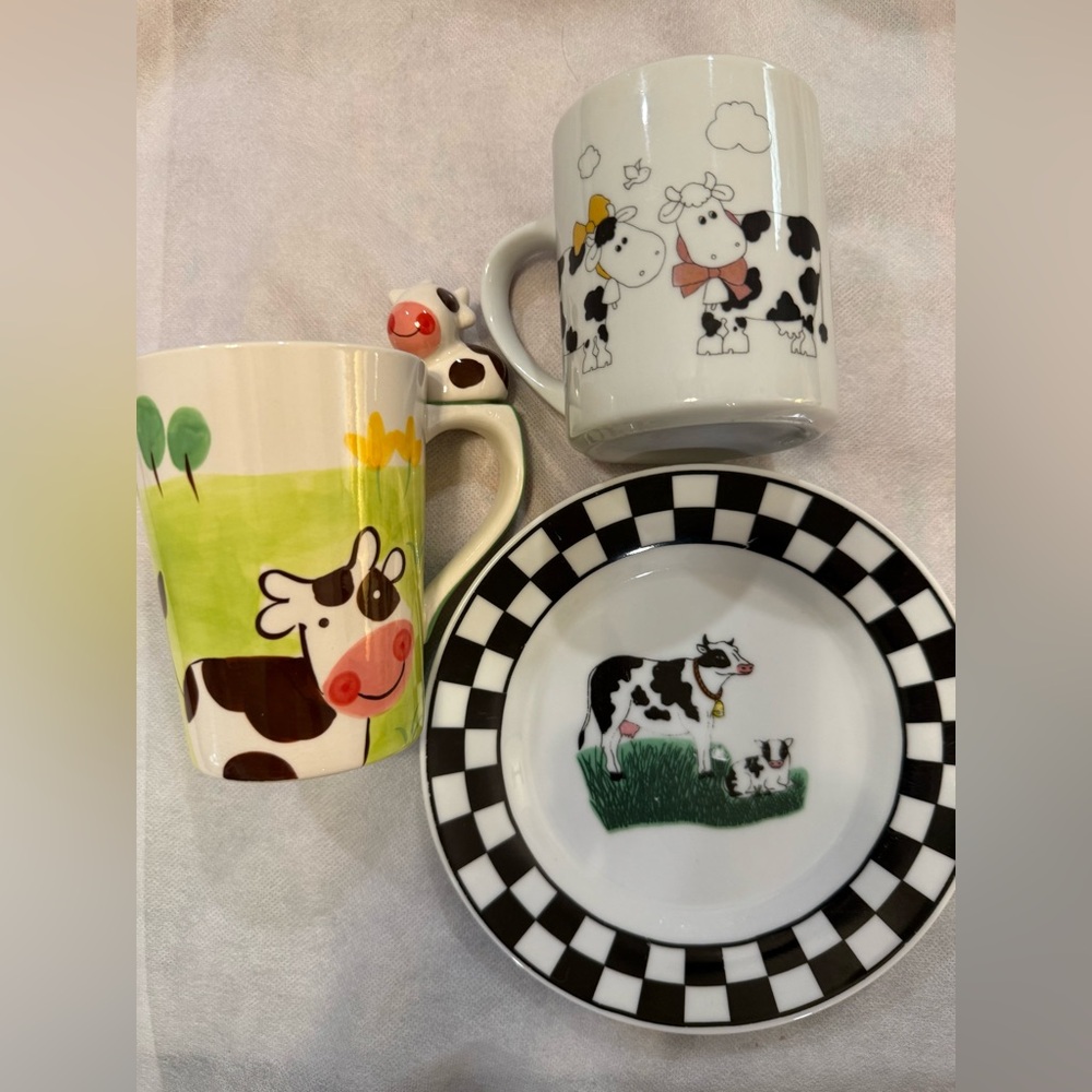 2 adorable cow mugs (12 oz) and a 7” KMC cow plate.